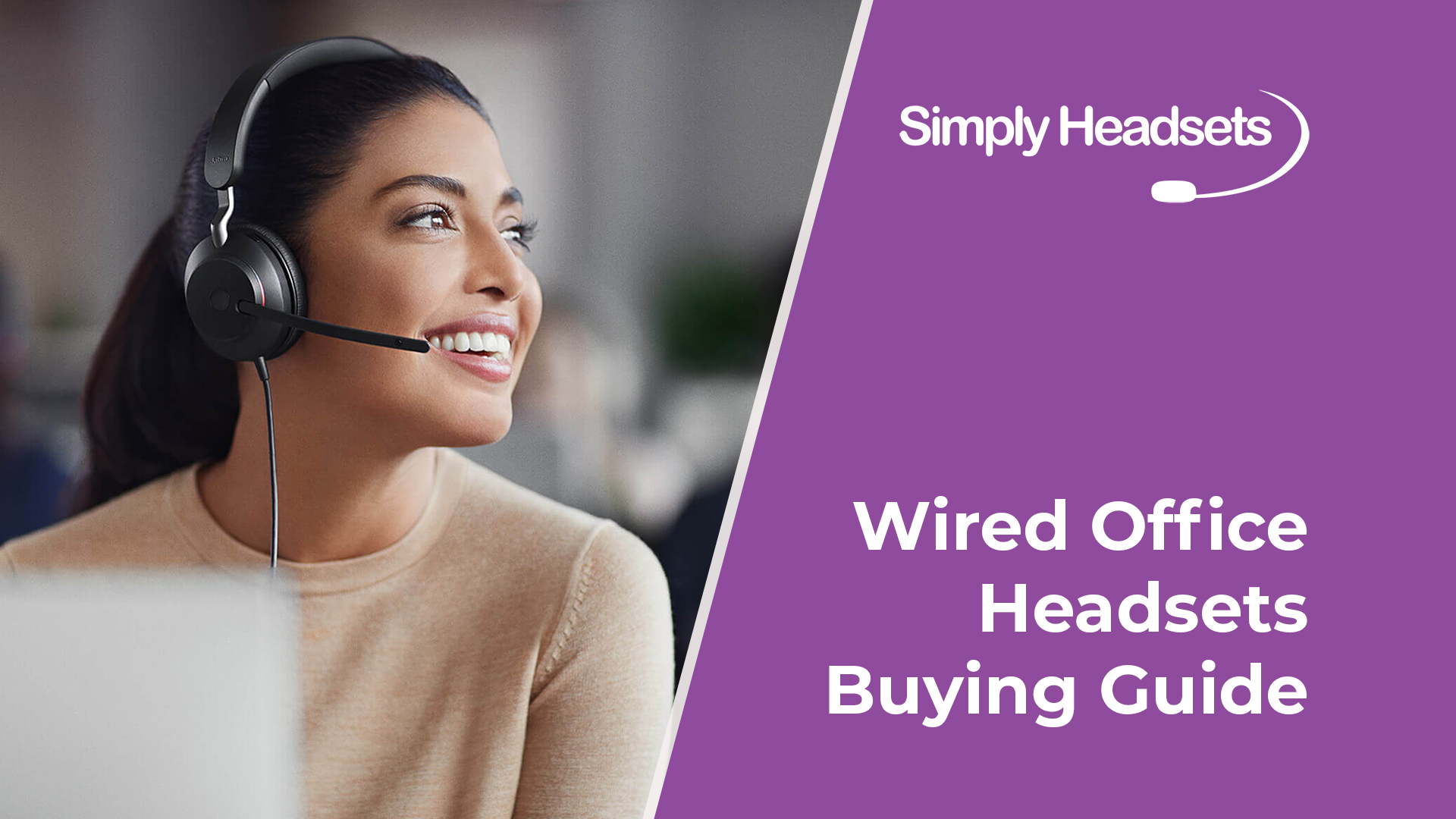 Woman smiling wearing a wired office headset