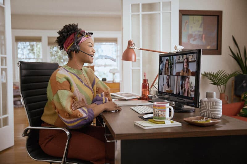 Image of Woman working from home wearing Plantronics headset