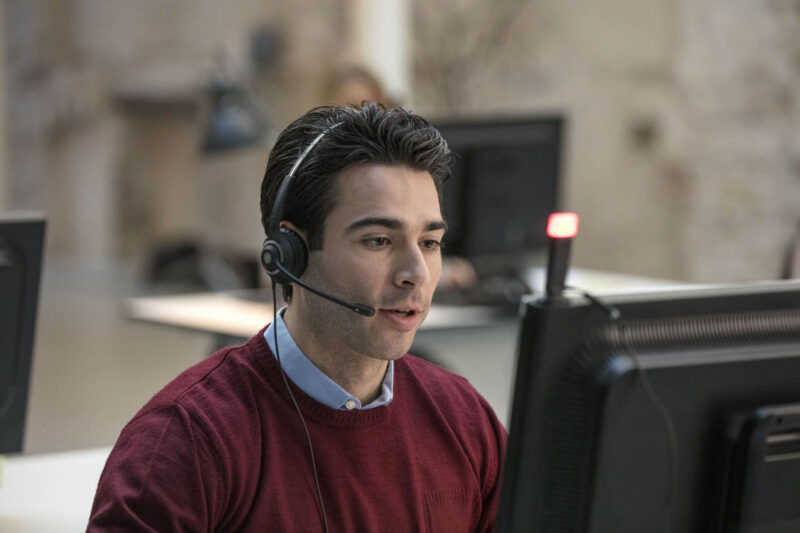 Man wearing wired noise cancelling headset