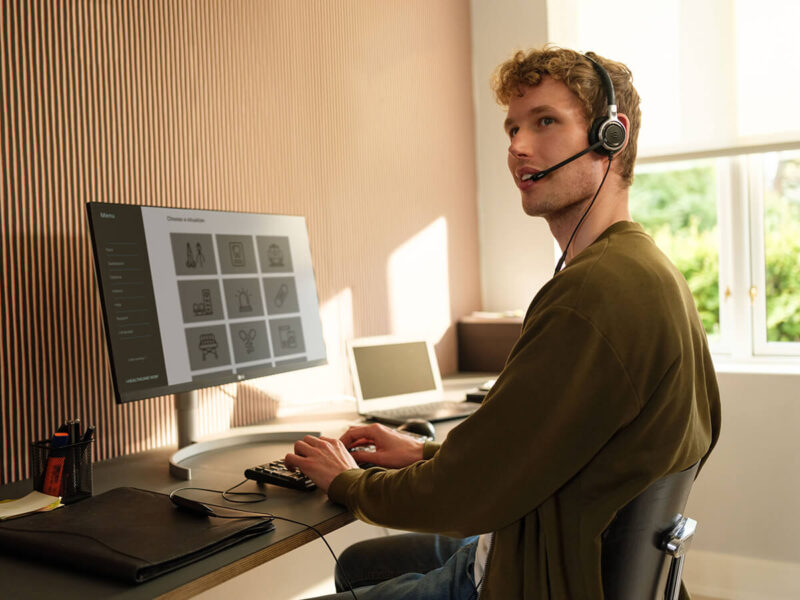 Image of male student wearing noise cancelling headset