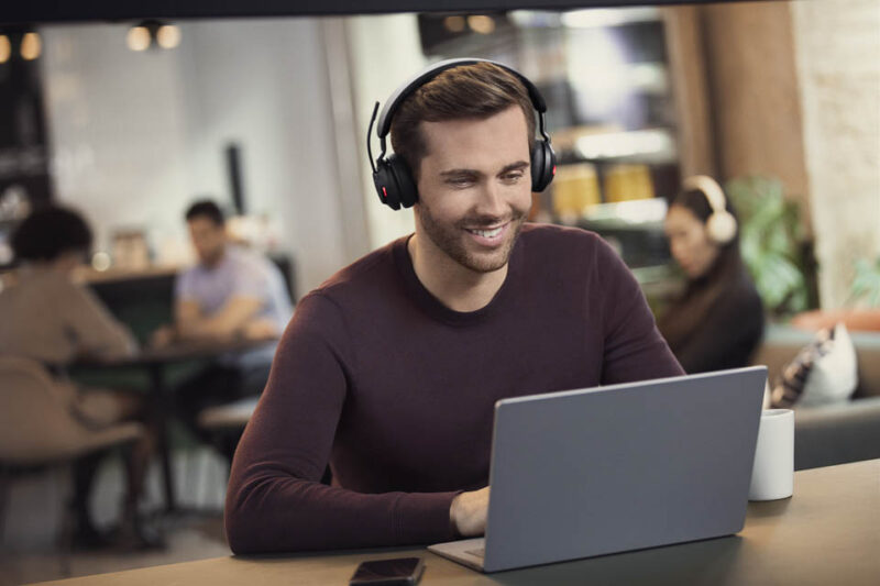 man wearing conference call headset