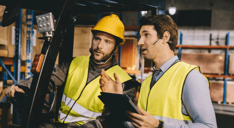 Image of construction worker wearing bone conduction headset